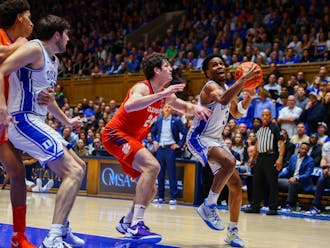 Senior guard Jeremy Roach drives to the basket in Duke's game against Clemson.