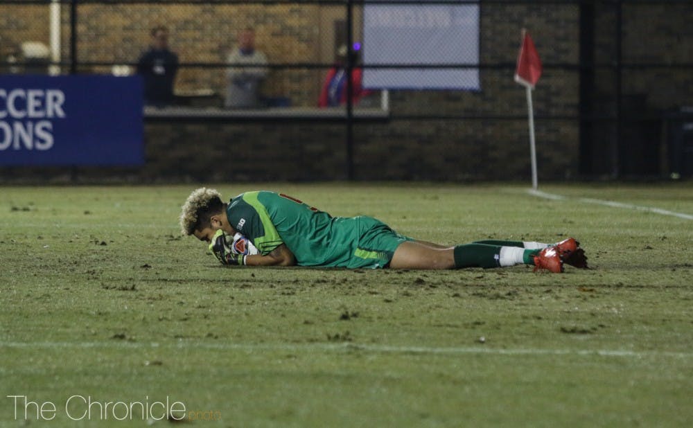 Maryland's goalkeeper collapses on a shot. 