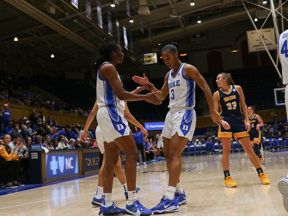 Jadyn Donovan (left) and Ashlon Jackson (right) celebrate during Duke's win against Toledo.