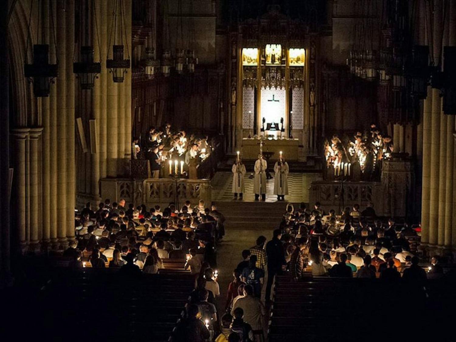 Worshipers at Duke Chapel participate in the All Hallows' Eve service, which takes place by candlelight Oct. 31.