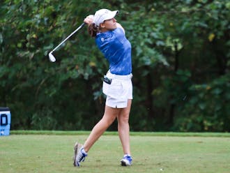 Virginia Elena Carta tied for the individual title with teammate Gina Kim.