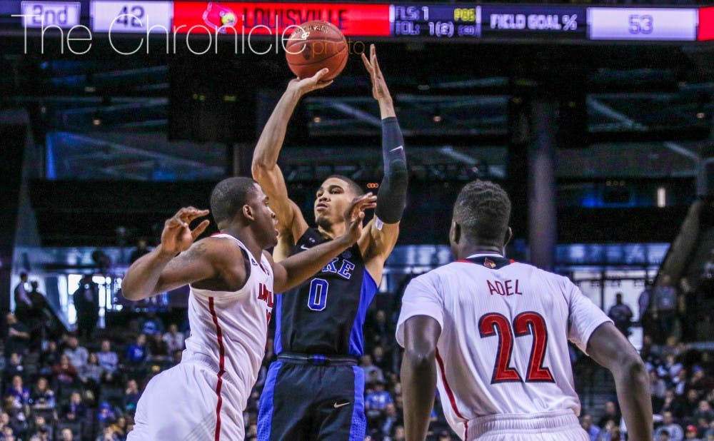 <p>Jayson Tatum poured in 25 points on 9-of-15 shooting to lead the Blue Devils past Louisville in the ACC tournament quarterfinals.</p>