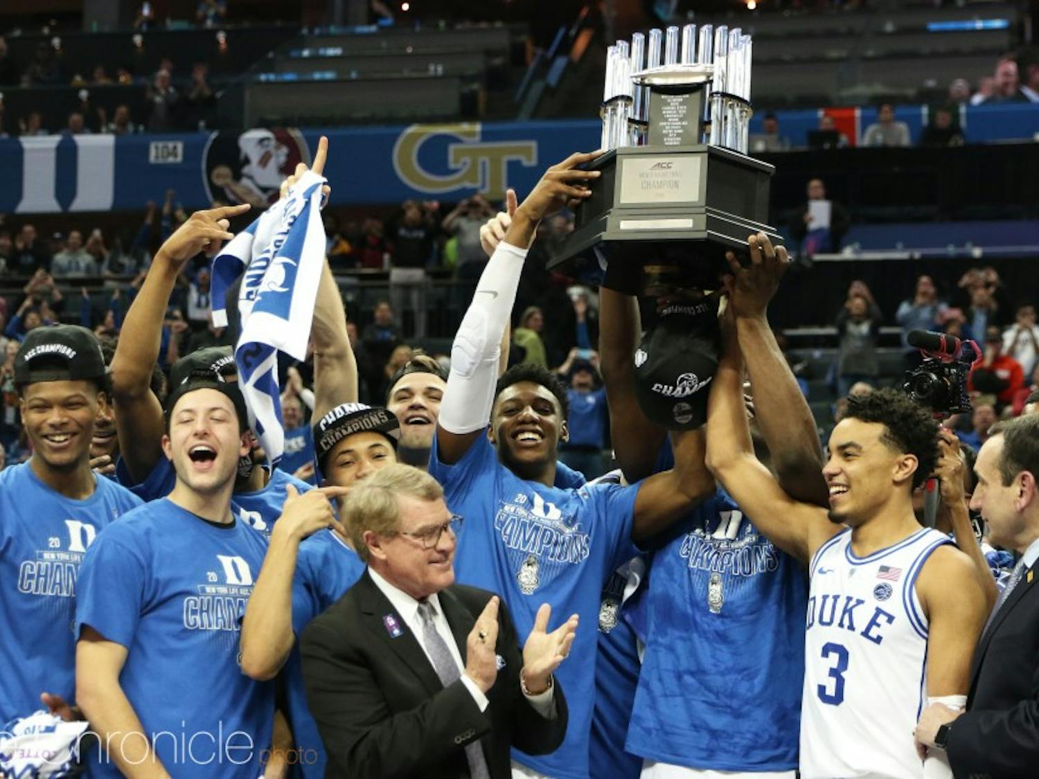 Duke's 2019 team raises the ACC tournament trophy. 