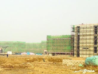 Duke Kunshan University in November 2012, after almost a year with no construction progress. Administrators and the city of Kunshan expect that the campus' first five buildings will be ready for students Fall 2014.