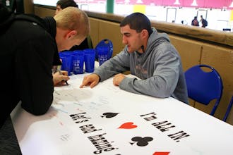Students sign an anti-hazing pledge in the Bryan Center Monday, as part of an initiative organized by the Hazing Prevention Coalition.