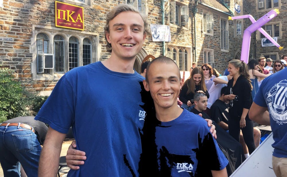 <p>Courtesy of Liz Menges | Bobby Menges, right, was known for his smile and drive to help others.&nbsp;</p>