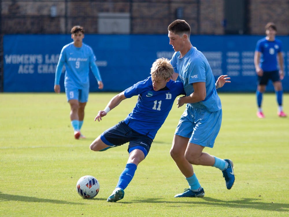 Colton Pleasants dribbles against a San Diego defender. 