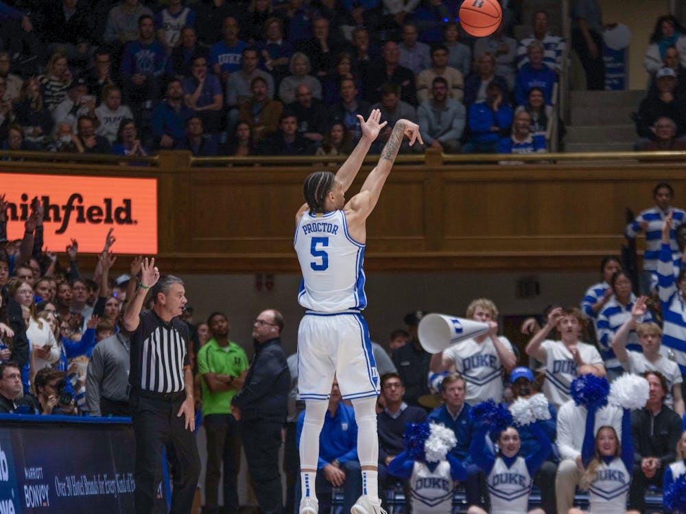 Tyrese Proctor attempts a 3-point shot against Pittsburgh. 