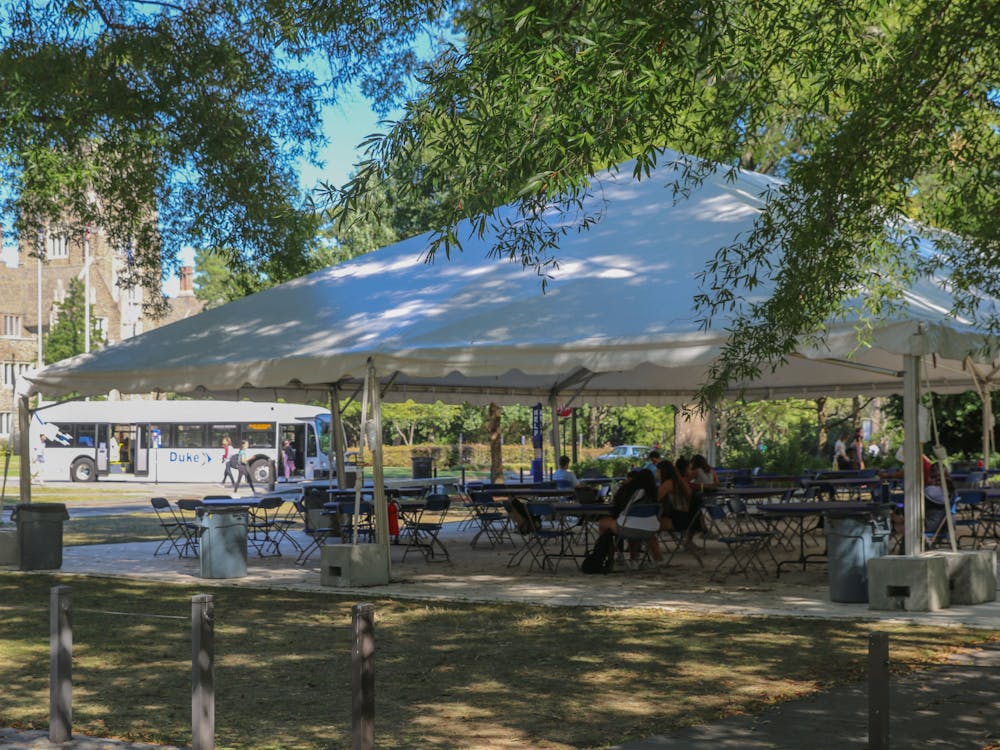 <p>Duke set up a tent for members of the community to eat outside in an effort to limit the spread of COVID-19.</p>