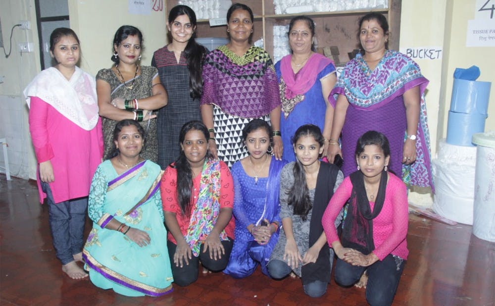 <p>Senior Suhani Jalota, a Baldwin Scholar third from the left in the back row, created a foundation to make it easier for Indian women to access menstrual hygiene products.</p>