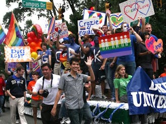 Participants march near East Campus in the annual N.C. Pride Festival and Parade last Fall. Two of Duke’s peer institutions are using admissions-based outreach efforts to bolster their LGBT communities.