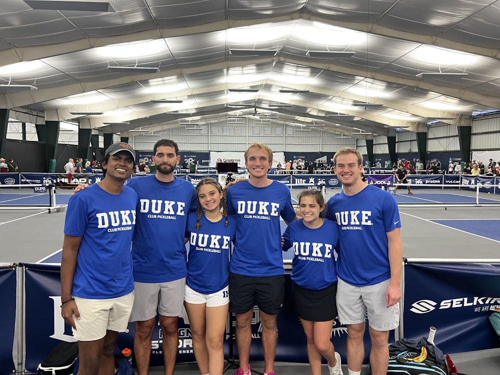 <p>Six members of Duke's club pickleball team during a tournament.&nbsp;</p>