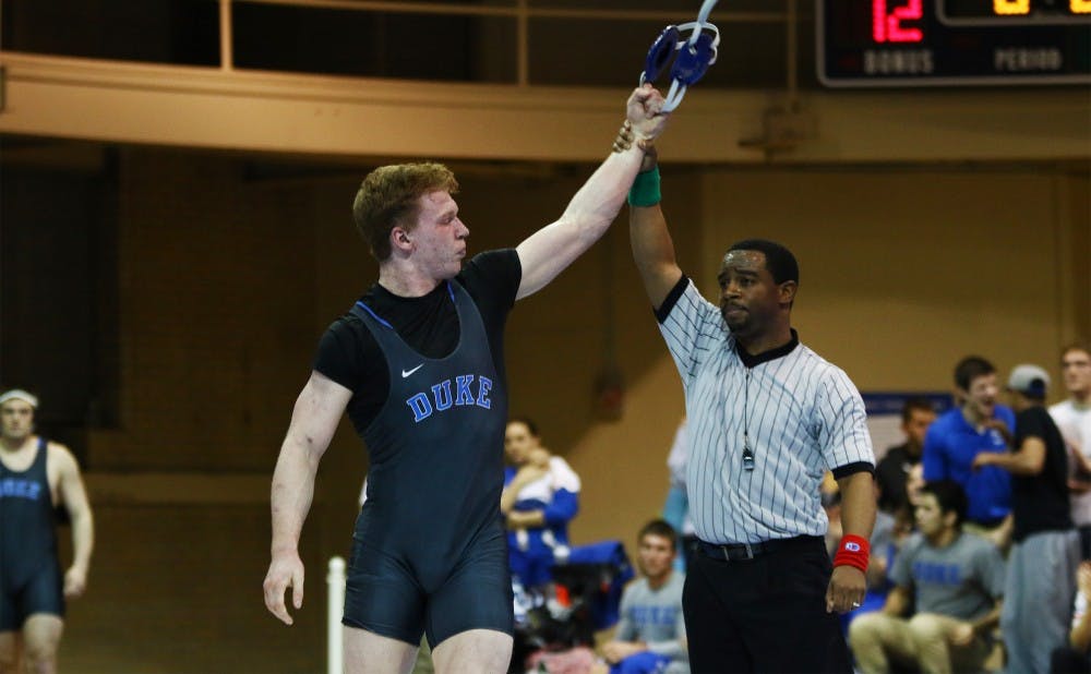 <p>Redshirt senior Conner Hartmann captured his second straight ACC title at 197 pounds Sunday night and will join three other Blue Devils at the NCAA championships at Madison Square Garden later this month.</p>