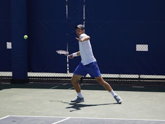Jason Tahir picked up a pair of singles wins this weekend as Duke split its weekend matches against Louisville and Georgia  Tech.