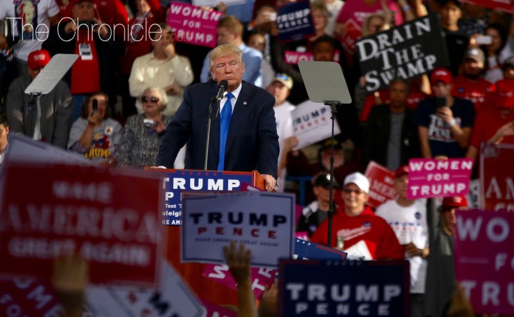 <p>Long before he became president, Donald Trump took in a Duke-North Carolina game courtside like many celebrities had before him.&nbsp;</p>