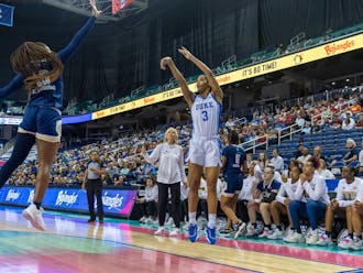 Ashlon Jackson holds her form after a 3-point jumper against Georgia Tech.