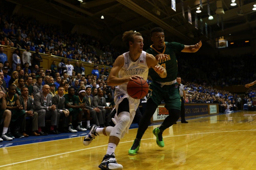 Luke Kennard did not score until the second half, but finished with nine points in his first game as a Blue Devil.