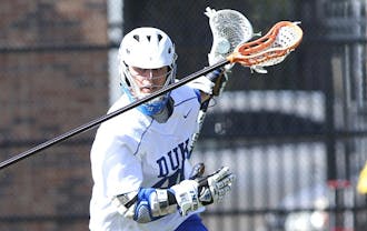 The first of Jordan Wolf’s two goals gave Duke an early lead, but Penn stormed back in the second half to upset the Blue Devils.