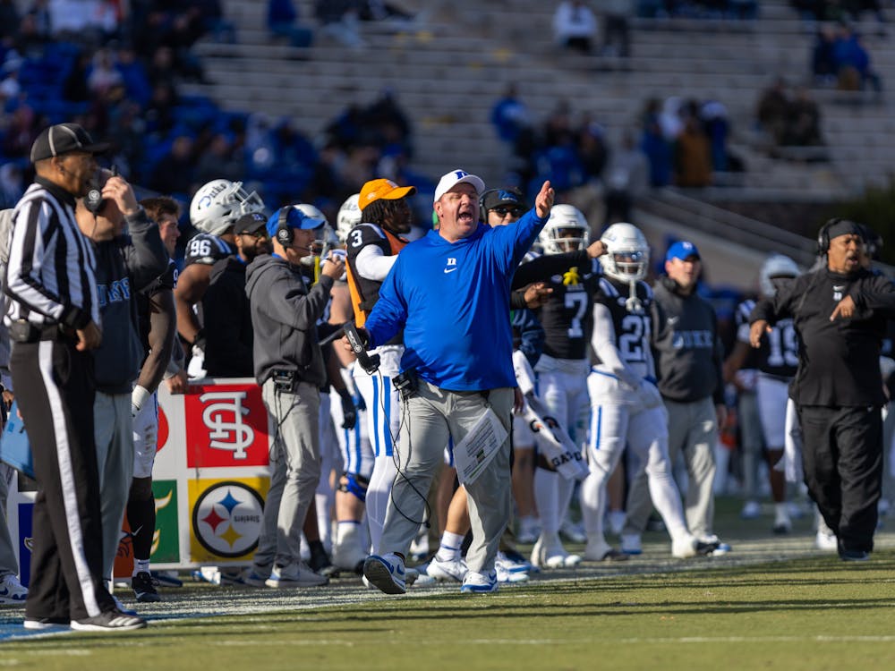 Former head coach Mike Elko yells from the sideline during Duke's win against Pittsburgh.