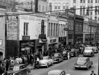 Durham’s Black Wall Street, populated by Black-owned businesses, Black residents and customers. Courtesy of Black Then: Discovering our History.