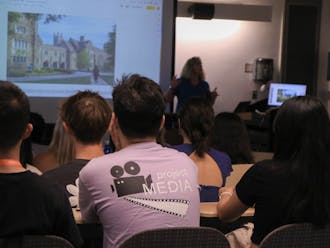 First-years in Project Media, one of the experiential orientation programs, participate in a photography workshop on Aug. 22, 2022.&nbsp;