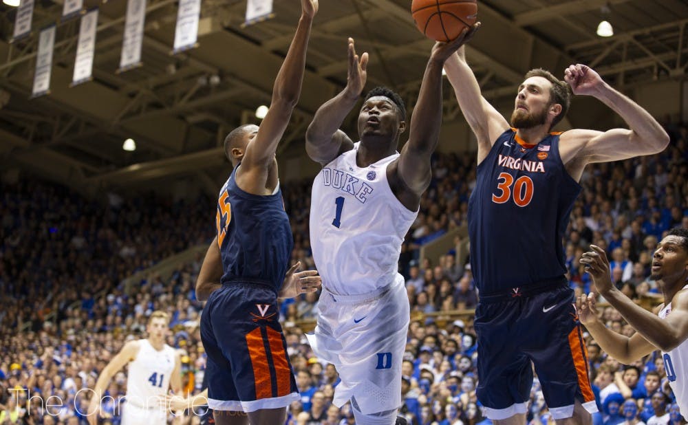 <p>Zion Williamson led the Blue Devils' effort to break the zone in the first half.</p>