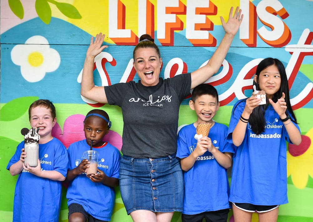 Andia Xouris, founder of Andia's Ice Cream, celebrating Duke Children's "Summer of Miracles" with Champion Patient Ambassadors.