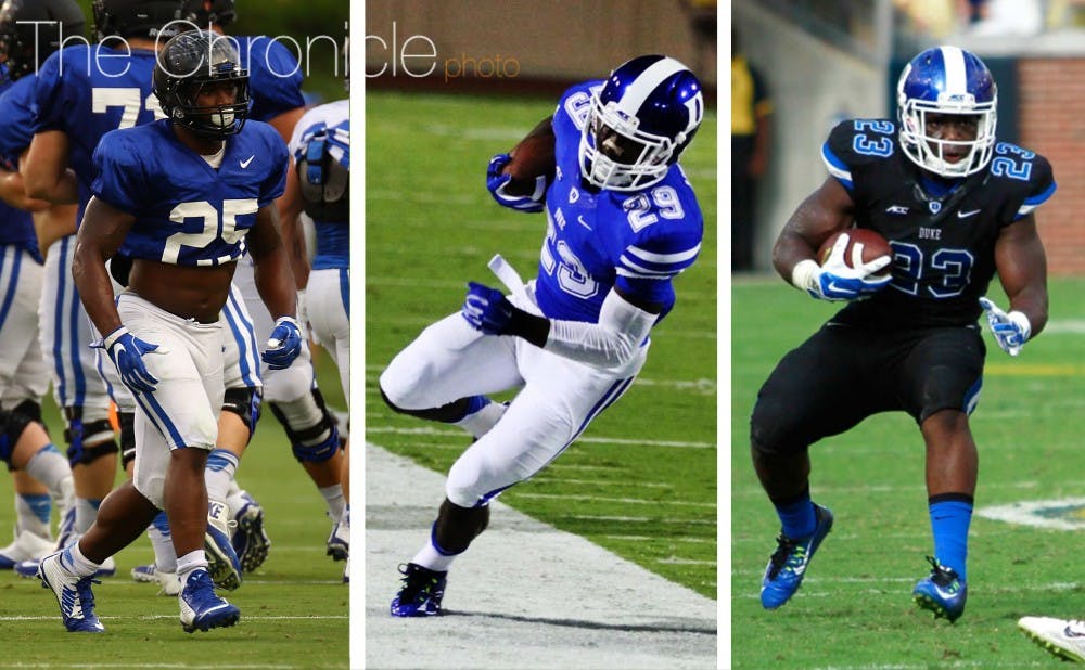 Shaun Wilson (29) and Jela Duncan (25) will split time as the leaders of Duke's running back corps this year, with Joseph Ajeigbe (23) providing depth and experience as a reserve.