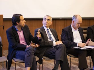 From left to right: Edgar Virugez, doctoral candidate in the Nicholas School; Michael Schoenfeld, vice president of public affairs and government relations; David Kennedy, vice president of alumni affairs and development.