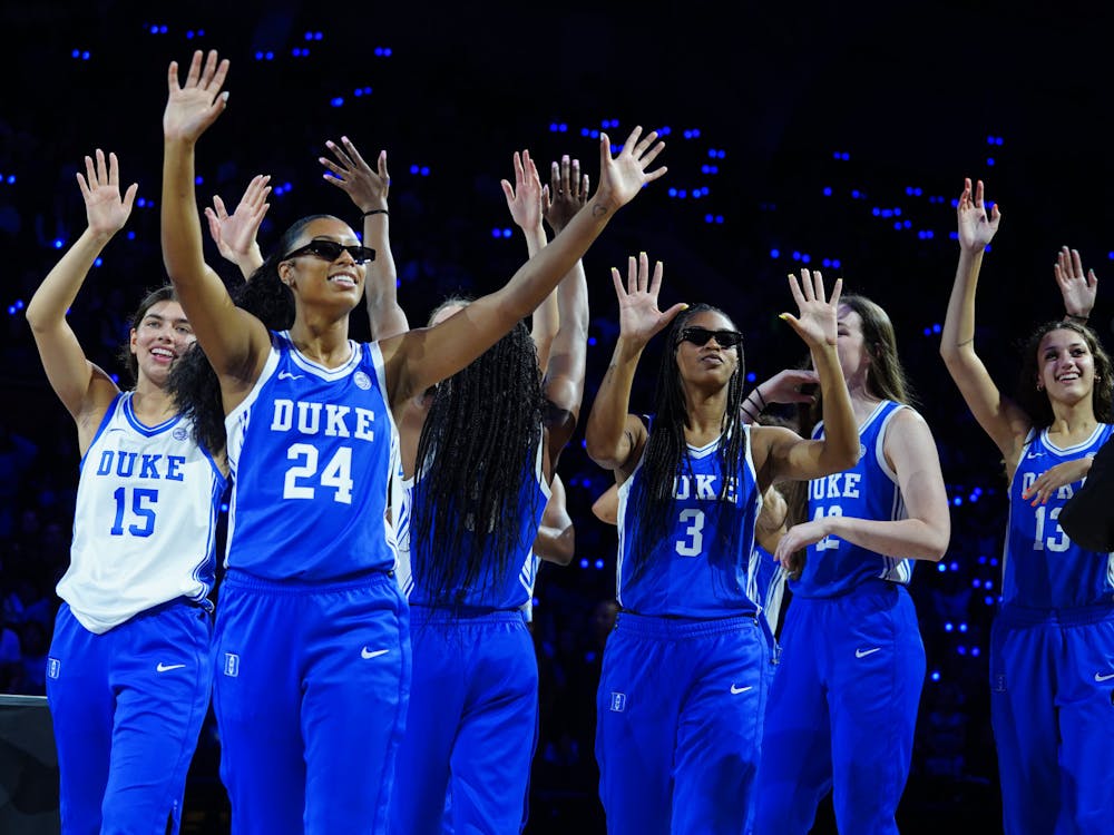 The women's basketball team waves to fans at 2023 Countdown to Craziness.