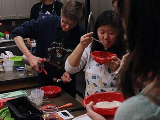 A freshman seminar taught by a chemistry professor and a professional chef applies basic principles of chemistry to cooking techniques. Students here experiment with making cheese.