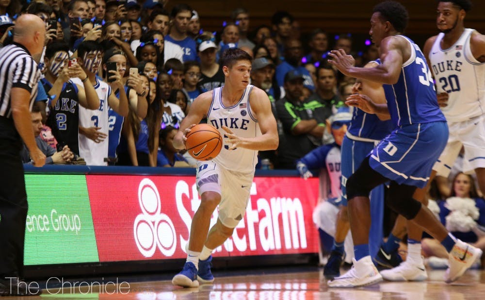 <p>Grayson Allen knocked down four triples and won the dunk contest by jumping over two cheerleaders.</p>