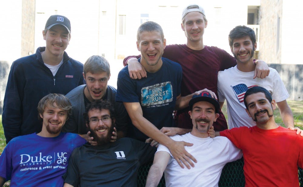 With a variety of facial hair styles, the men’s cross country team looks set to perform well in the “Stachies for Nashies” photo competition.