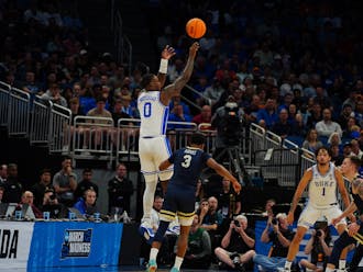Dariq Whitehead attempts a three during Duke's opening-round NCAA tournament victory against Oral Roberts.