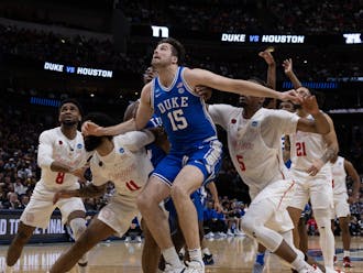 Ryan Young boxes out under the basket in Duke's Sweet 16 victory against Houston.