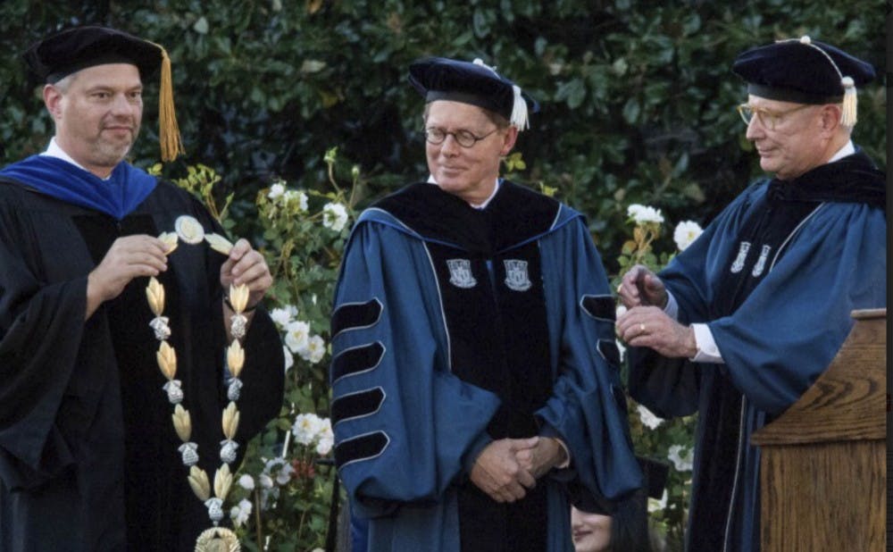 <p>Vincent Price, center, is inaugurated as president. Board Chair Jack Bovender, right, led his search committee.&nbsp;</p>