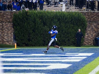 Jordan Waters rushes into the end zone against N.C. State.