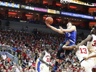 Grayson Allen drives through the lane Saturday, trying to draw contact. Allen went 8-of-9 from the charity stripe but was also called for three offensive fouls trying to create space agains the Cardinals.