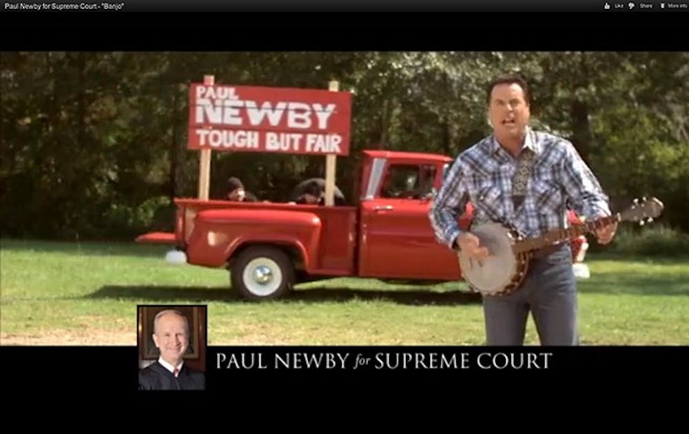 A banjo-themed video, paid for with fundraising dollars, contributed to the recent re-election of state Supreme Court Justice Paul Newby, Trinity ’77.