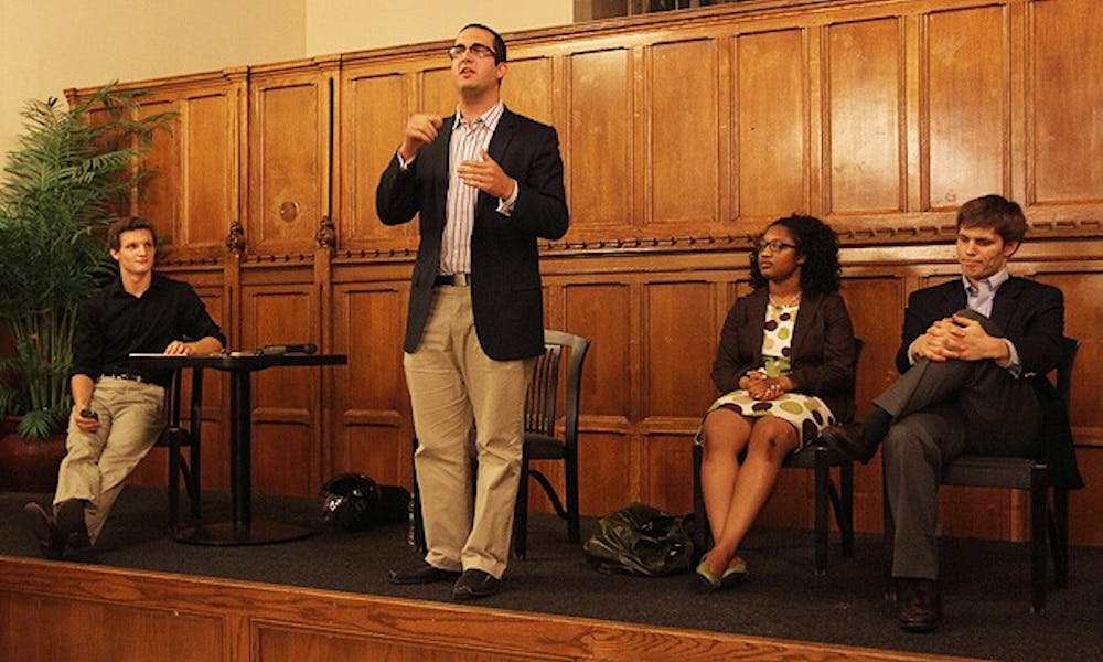 DSG president candidates Isaac Mizrahi, Ashley Jordan and Pete Schork answer questions on policy priorities at a debate in the Great Hall Monday.
