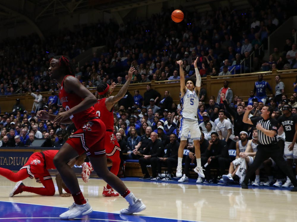 Tyrese Proctor lets one fly from the corner in Duke's win against Louisville.