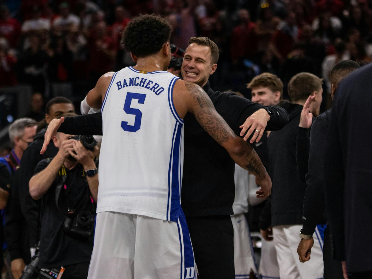 Saturday's Final Four matchup starts the next chapter of the rivalry, one with new faces at the helm in Duke head coach-in-waiting Jon Scheyer and North Carolina head coach Hubert Davis.