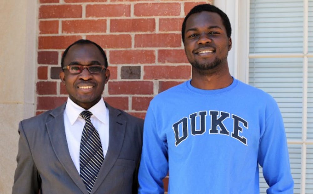 <p>Kenneth Rubango (right) and Henry Kiwumulo (left) received full scholarships to study biomedical engineering at Duke.&nbsp;</p>