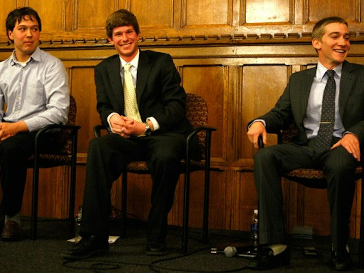 The three Duke Student Government presidential candidates—juniors Will Passo (left), Gregory Morrison (center) and Mike Lefevre (right)—face off in the pre-election debate in the Great Hall Wednesday night. The candidates outlined their individual platforms and took questions from the 50 students in attendance.