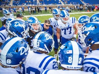 Our beat writers all agree that Duke will start off its season with a win against Temple.
