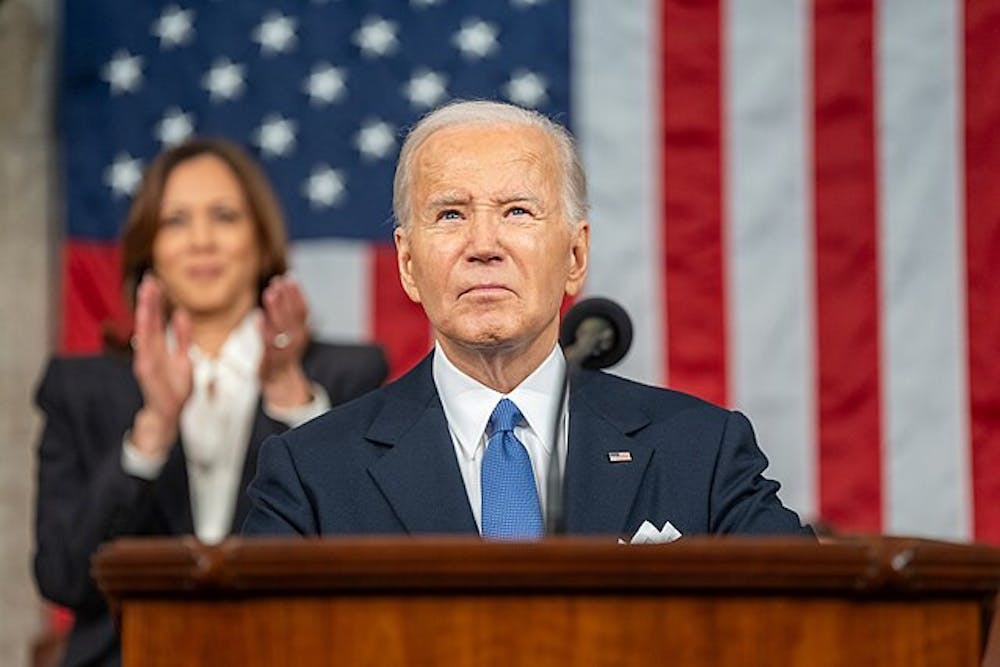 <p>President Joe Biden (right) delivers his 2024 State of the Union address alongside Vice President Kamala Harris (left).</p>