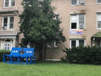 A poster hanging from a window hints at Jarvis dorm's purpose as an isolation space, reading, "We are bored. Yell up to say hi."&nbsp;