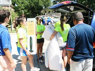 FACs help freshmen and their families move in on Tuesday.