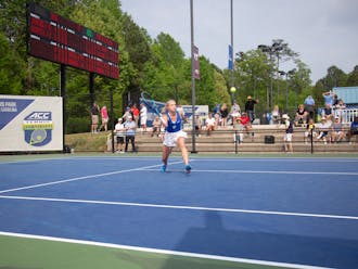 Emma Jackson hits a volley in the ACC tournament. 