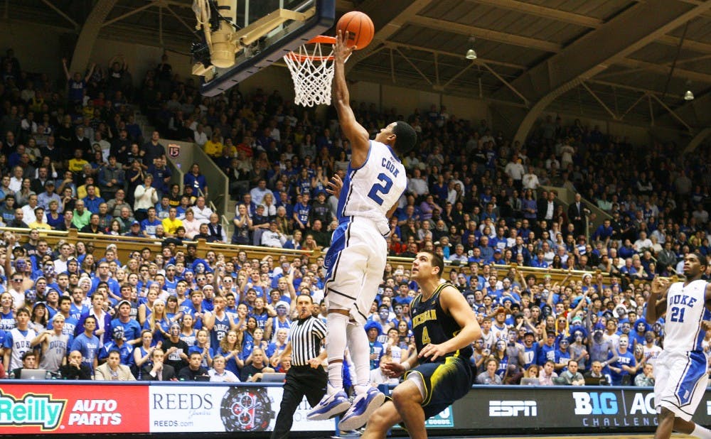 Behind 24 points and nine assists from Quinn Cook, Duke ran past Michigan 79-69 in the ACC/Big Ten Challenge.